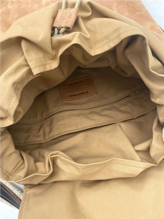 eco leather backpack made in amsterdam snekkerbuks cognac closing