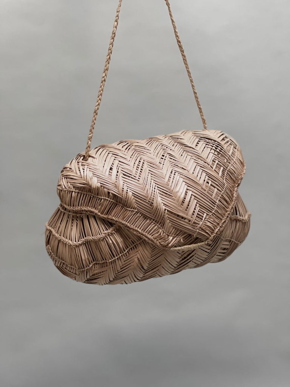 incausa carrying basket by Xavante handmade bag buriti fiber large