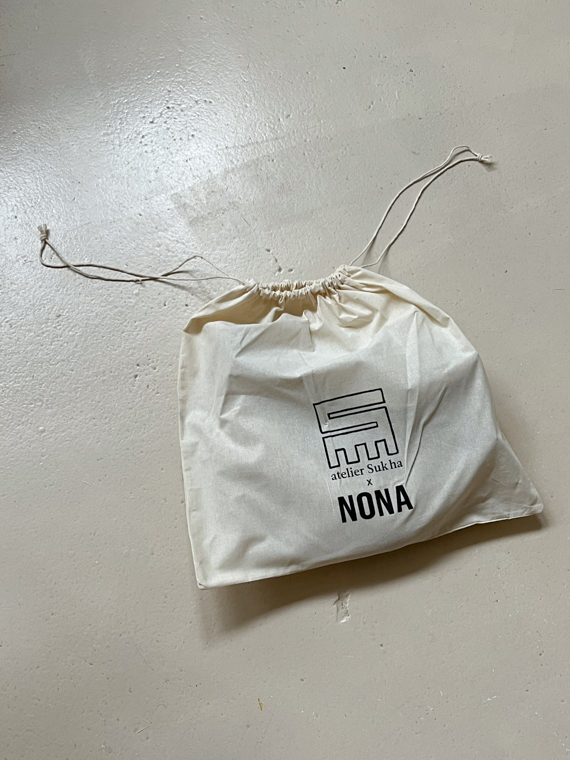 nona handbags banana bag sand shop online canvas bag special edition collaboration sukha dust bag