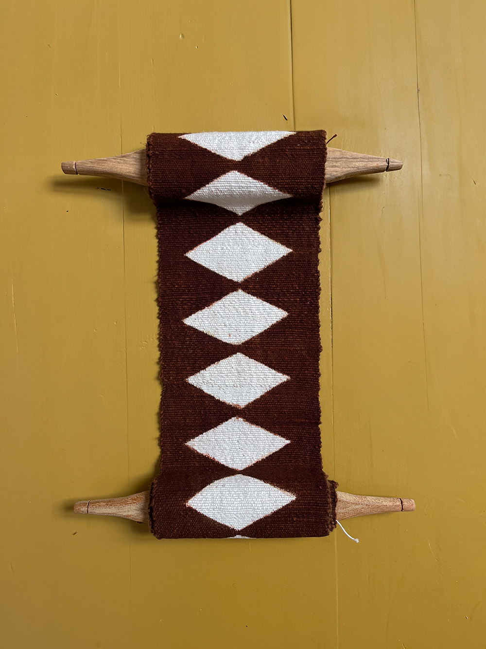 swing totem brown white aaaacoop wallhangings