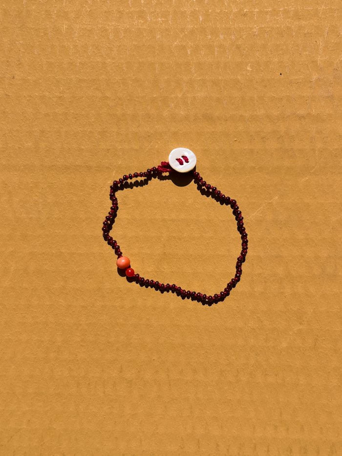 hand knot jewellery beads bracelet maroon glass beads red bracelet packshot cover