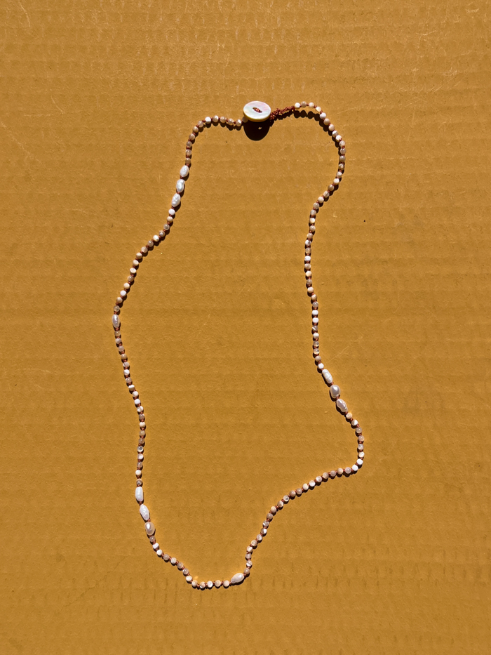hand knot jewellery beads necklace shell packshot cover