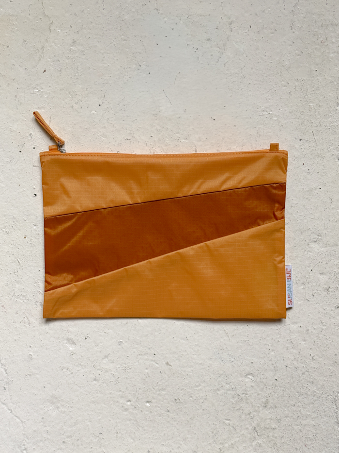the new pouch medium susan bijl riptop sustainable fabric waterproof calendula & ginger cover