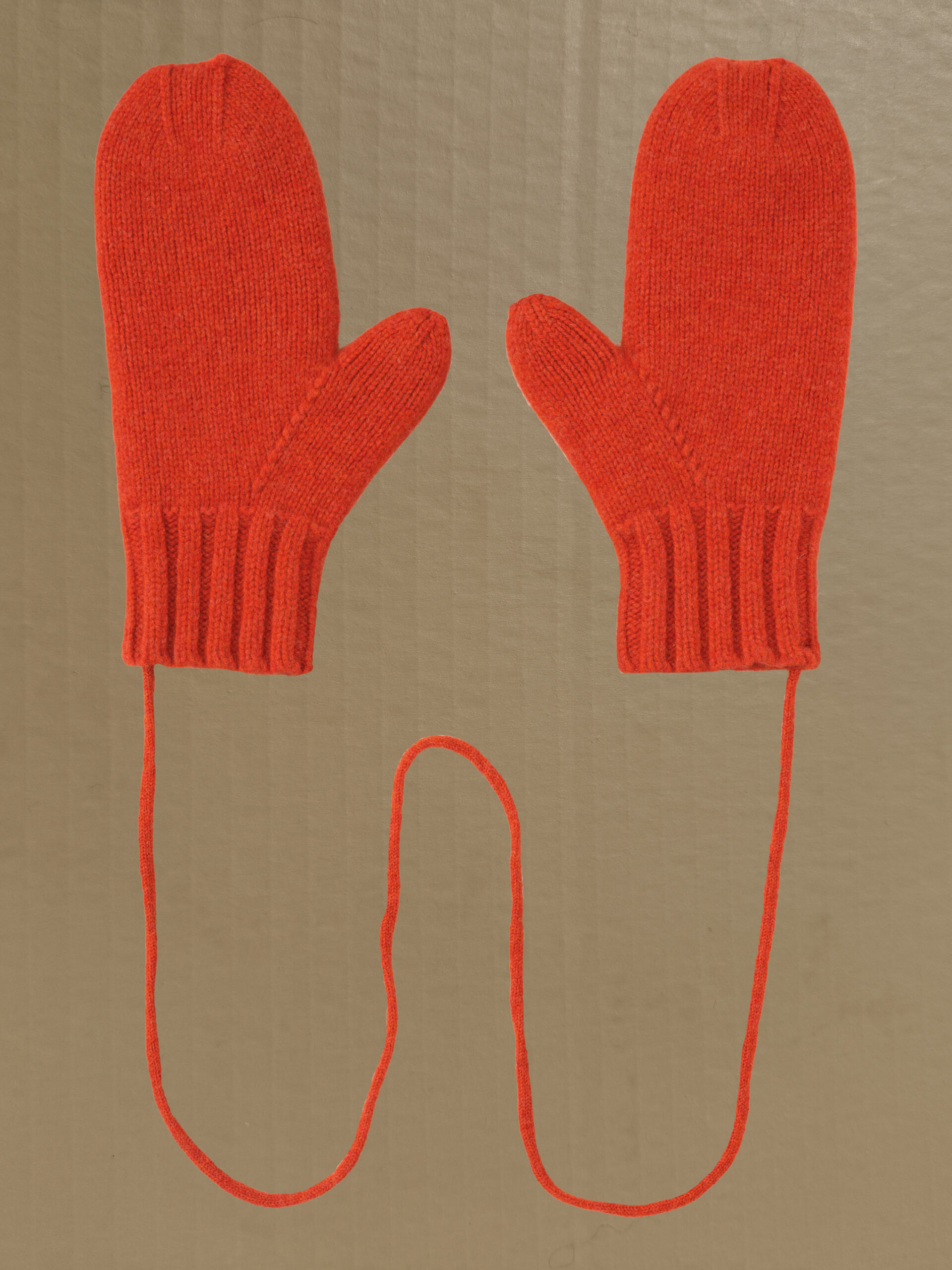 Felted plain mittens on string furnace Scottish spun lambswool knitted Leicestershire England product